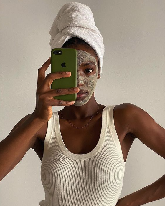 Facial treatment for acne-prone skin using natural and professional skincare products.